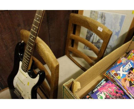 A set of five light oak bar back dining chairs to include one carver