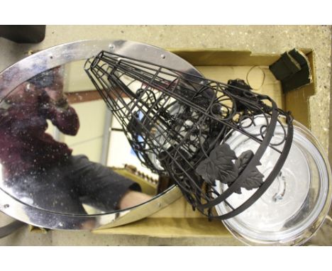 An oval wall mirror; two metal hanging baskets etc.