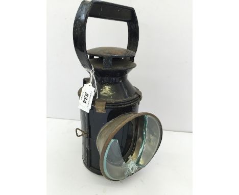 A BR(W) 3 aspect hand held parafine Lamp with Red, Green and clear lens. Complete with Burner. Glass lens broken.