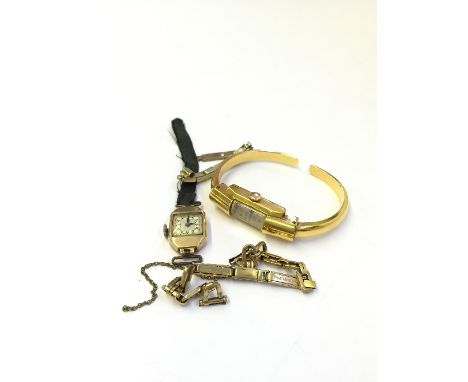 A ladies' 9 carat gold Art Deco square faced wristwatch together with a ladies' ruby yellow metal cased wristwatch.