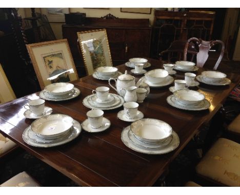 The residue of an extensive Noritake bone china tea and dinner service, decorated in the Greenbrier pattern.