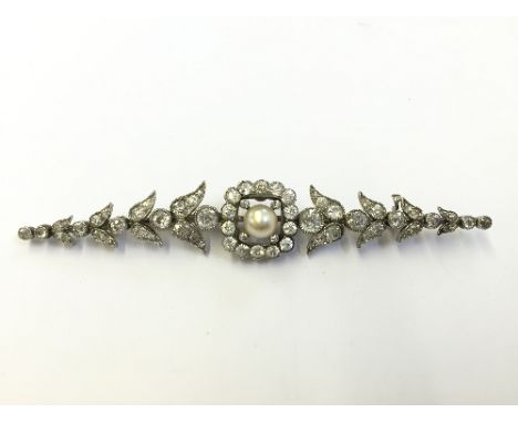 A large white metal diamond and pearl set bar brooch, reconstructed from other jewellery items, approx 2.6 cts TDW