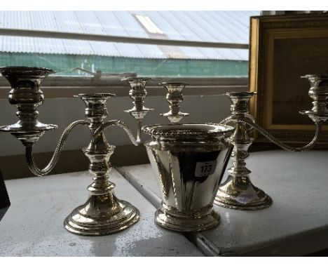 A pair of silver plated three branch candelabras together with a small silver plated pot by Graham & Morton.