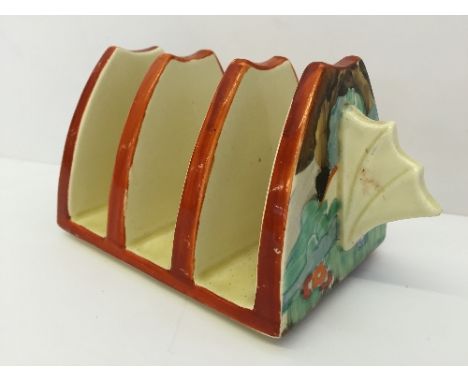 A Clarice Cliff, Newport Pottery, England three division Daffodil shaped toast rack, decorated in the Forest Glen pattern, ci