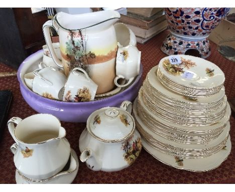 The residue of an Alfred Meakin tea and dinner service, decorated in the Country Life pattern together with a Royal Doulton C