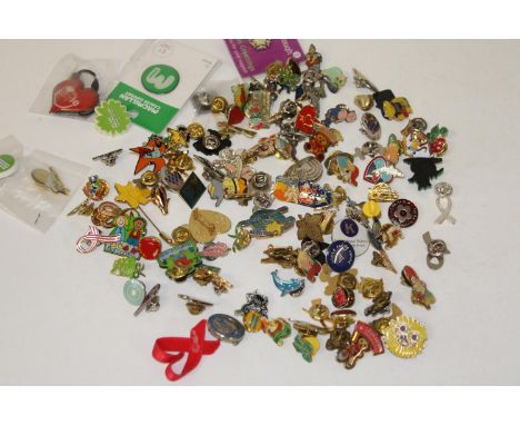 A selection of assorted enamel badges &amp; other 