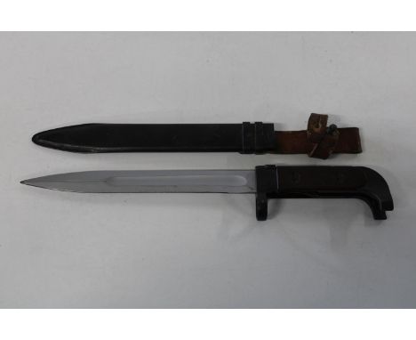 A Soviet AK47 bayonet with aluminum blade complete with scabbard 