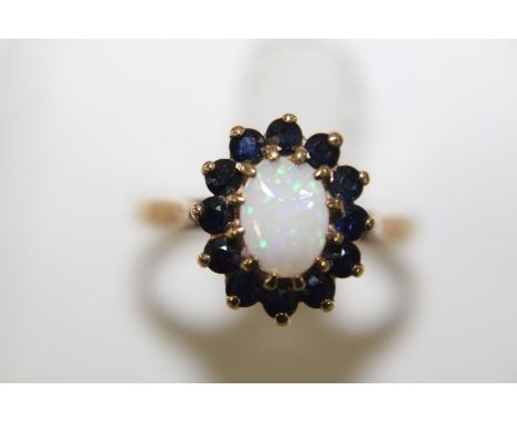 A 9ct gold opal &amp; sapphire cluster ring (chip on opal) size N 1/4 