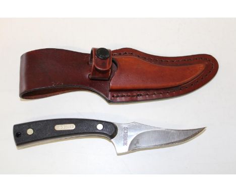 An old timer skinning/sheath knife by Schrade with sheath 