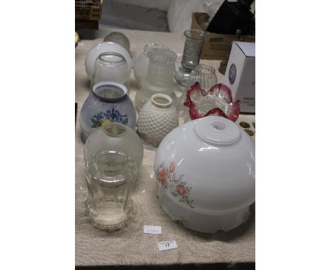 A large job lot of assorted vintage glass lamp shades 