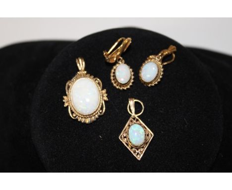 Two 9ct gold opal pendants &amp; a pair of 9ct gold &amp; opal earrings 