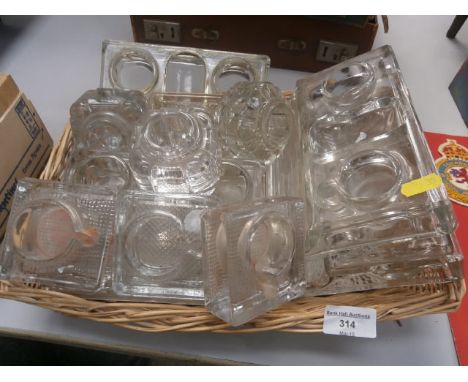 basket of vintage glass inkwells