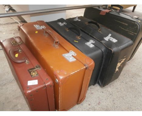 6 vintage suitcases