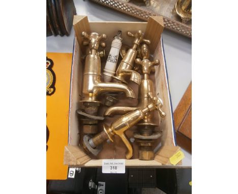 box of brass taps & ceramic pull