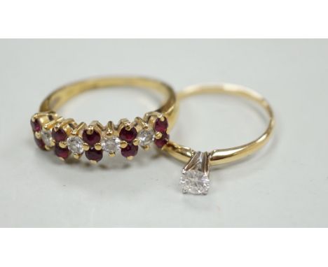 A modern 18ct gold, ruby and diamond cluster set half hoop ring, size L, gross weight 3.4 grams and a 14k and solitaire diamo