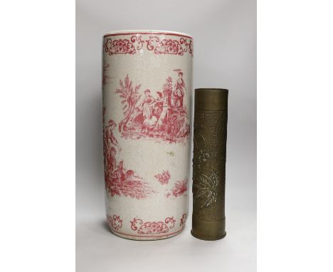 A 20th century crackle ware pottery stick stand, with toile de jouy all over design and a trench art vase, stick stand 48cms 