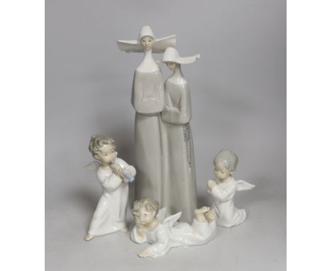 A selection of four assorted Lladro ceramic figures. Tallest 32.5cm