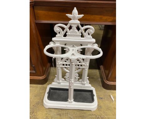 A Victorian painted cast iron two division stick stand, width 56cm, depth 25cm, height 89cm