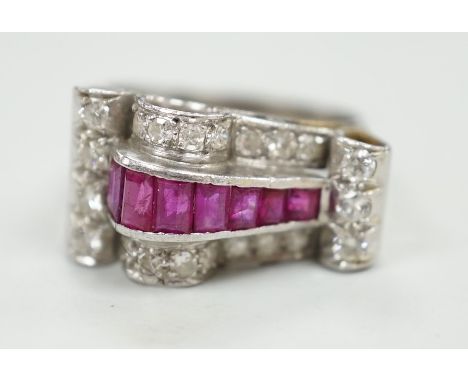 A 1950's? white metal, graduated ruby and diamond cluster set cocktail ring, size Q, gross weight 9.1 grams.