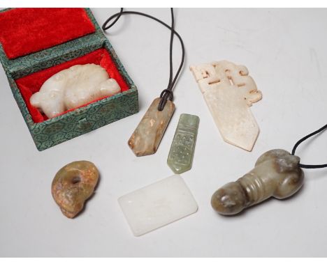 A group of various Chinese jade carvings and a white glass plaque