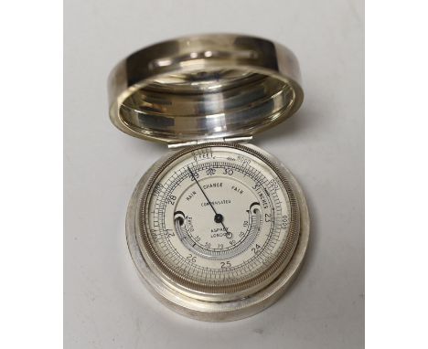A George V  Asprey &amp; Co silver cased barometer, London, 1922, diameter 56mm.