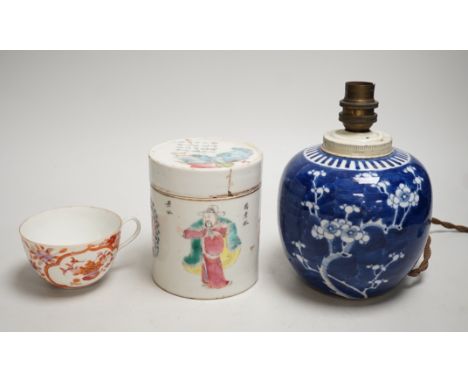 A 19th century Chinese famille rose cylindrical jar and cover, 11.5cm high, a blue and white prunus lamp and a Japanese eggsh