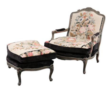 A GREEN AND GILT PAINTED FAUTEUIL OF FRENCH DESIGN upholstered in leaf tapestry and studded, on cabriole front legs, 96cm hig