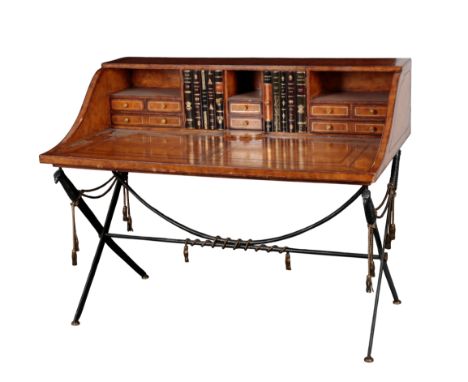 MAITLAND-SMITH: A LEATHER COVERED AND METAL 'CAMPAIGN DESK' the gilt tooled top fitted eight drawers and two cupboards enclos