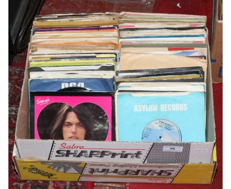 A box of 45rpm record singles rock and pop including Queen, Rolling Stones, Wings, Electric Light Orchestra and Thin Lizzy et