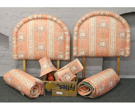 A collection of bedroom soft furnishing two single bed heads boards with quilts, matching pelmet cover and bed side lamp with
