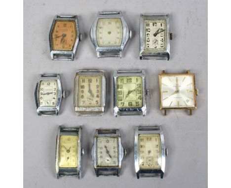 Ten gentleman's vintage manual watch heads, mainly Tank watches, for spares or repair.
