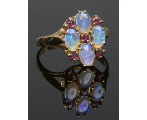 A 9ct gold opal and ruby ring of floriform, size Q.