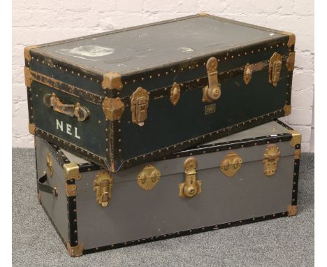 A vintage fitted travelling trunk monogrammed N.E.L and another.