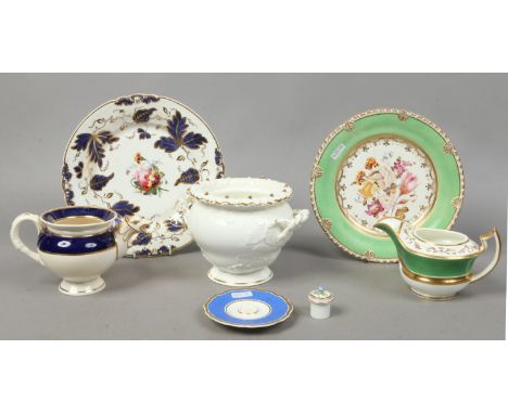 A collection of Rockingham porcelain including an anthemia and gadroon moulded plate painted with flowers in the manner of Jo