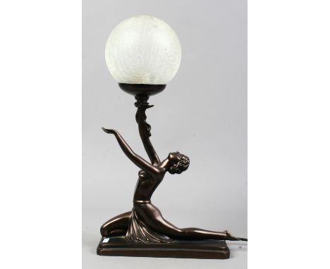 An Art Deco style figural table lamp formed as a semi naked girl with crackled glass shade.
