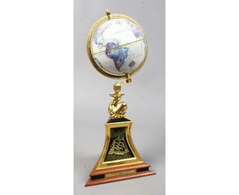 A Nautical Heritage Society navigators globe by The Franklin Mint.