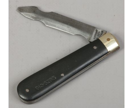 A military issue single blade multi tool pocket knife A. Wright &amp; Son Sheffield, broad arrow mark.