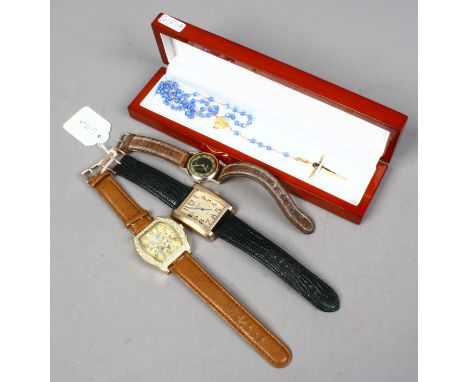 Three wristwatches including an Elbee manual example, along with a string of rosary beads.