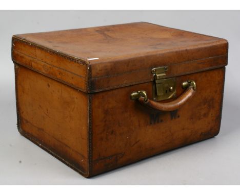 An Insall &amp; Son Bristol leather top hat case with manufacturers mark, monogrammed M.W.