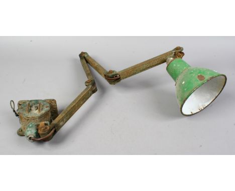 An industrial adjustable anglepoise lamp.