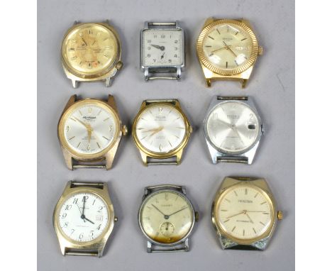 Nine gentleman's vintage manual watch heads, spares or repair.
