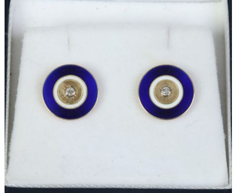 A pair of 18ct gold enamel and diamond earrings of circular form.