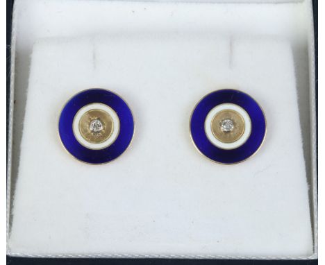 A pair of 18ct gold enamel and diamond earrings of circular form.