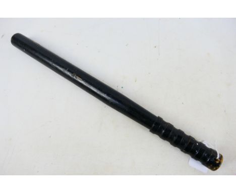 A turned wood truncheon or priest, ebonised and weighted, 20th century, 40 cm (l). [W]