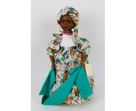 Alberon - An unboxed Alberon porcelain doll named Carmen with stand. It appears in Good condition overall. (This does not con