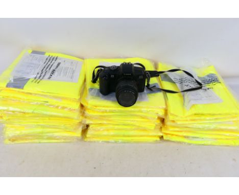 A quantity of Hi Viz waistcoats, size XXXXL and a Canon EOS 5000 camera. [W]