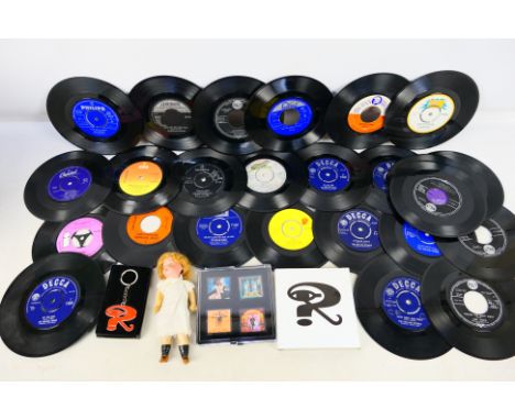 A small quantity of 7" vinyl records to include Fleetwood Mac, Carly Simon, The Rolling Stones, Bob Dylan, Cat Stevens and ot