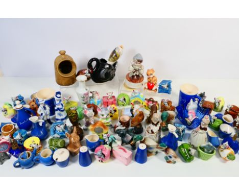 A collection of various ornamental wares to include Wade, Beckwood, Moorcraft and other. [W]


NOTE: IN HOUSE SHIPPING IS NOT