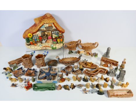A collection of Wade and similar to include Whimsies, dishes, pots and other, also a cruet set, probably Carrigaline and a Pe