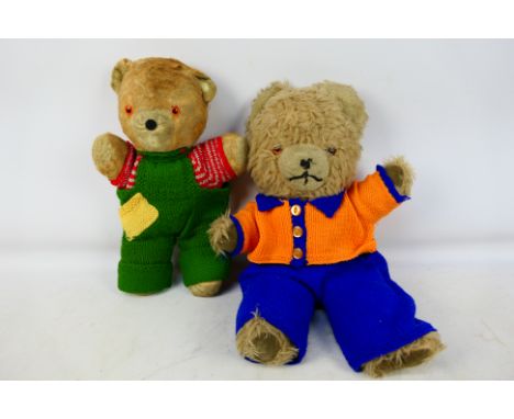 Teddy Bears - A pair of vintage teddy bears in knitted clothing (measuring 50cm & 38 cm tall). Items appear to be in mostly g
